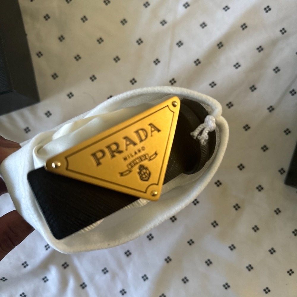 Black Prada Belt with Gold Buckle.